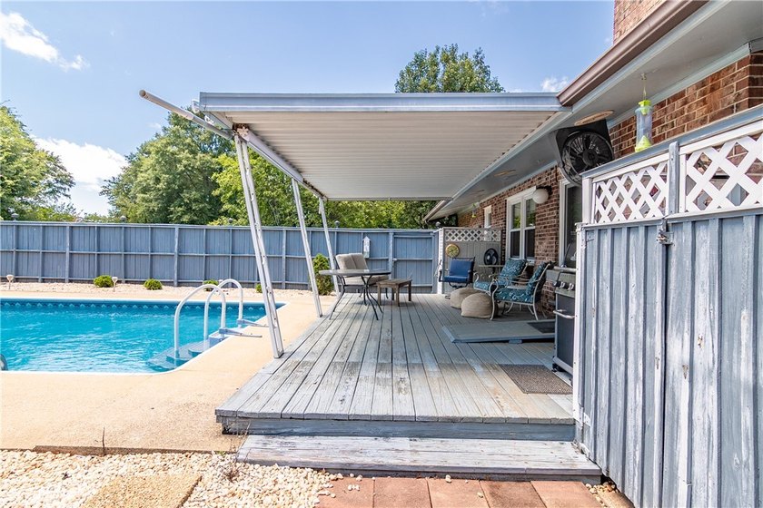 Spacious Brick Ranch with Salt-Water Pool in T.L. Hanna - photo 7
