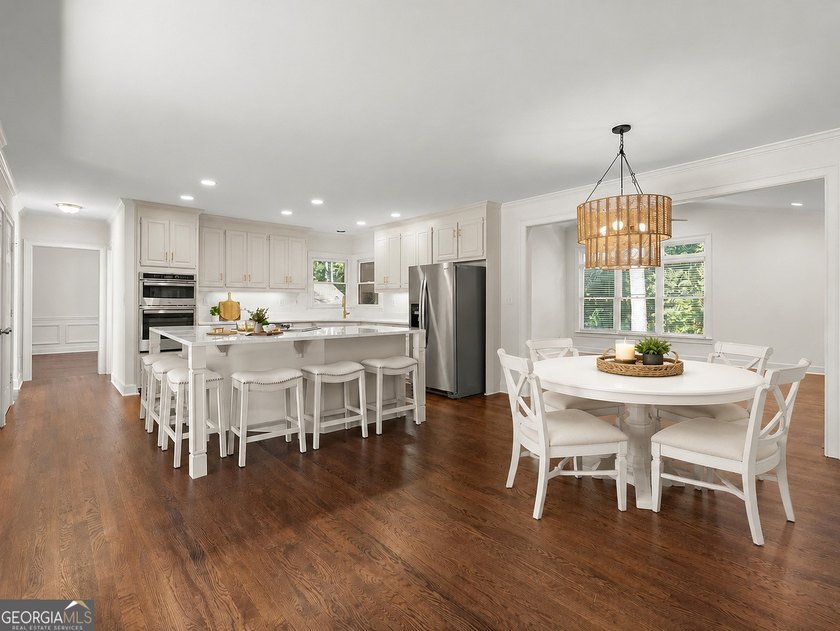 DO NOT MISS this Brick Beauty in coveted Hampton Woods with a - photo 8