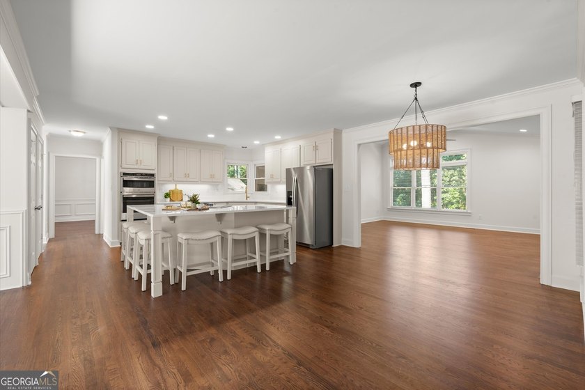 DO NOT MISS this Brick Beauty in coveted Hampton Woods with a - photo 9