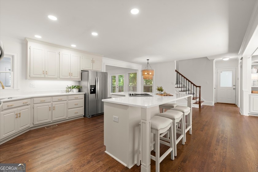 DO NOT MISS this Brick Beauty in coveted Hampton Woods with a - photo 10