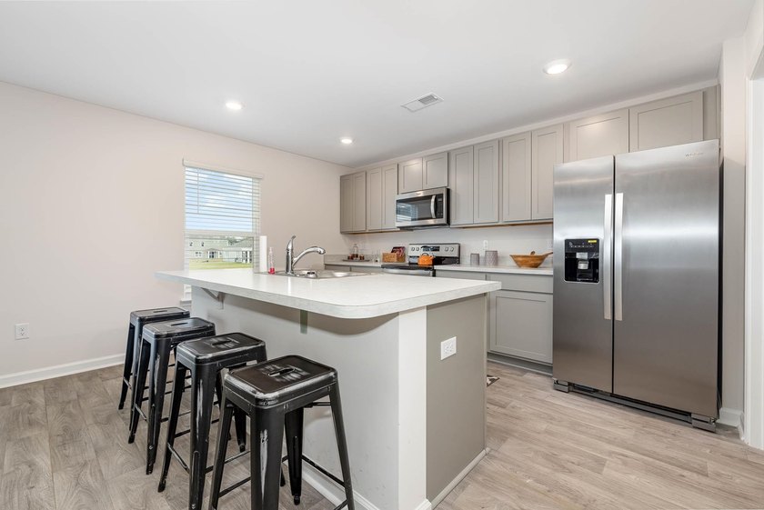Welcome to The Meadows at Wildwood Village. Residents will enjoy - photo 9