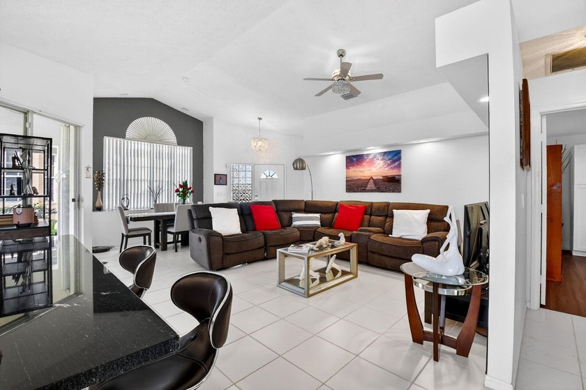 Welcome to a beautifully reimagined lakefront Turnkey home. This - photo 3