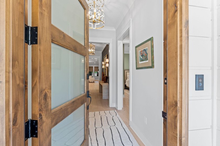 Exquisitely decorated fully furnished, custom 2025 home sits on - photo 3