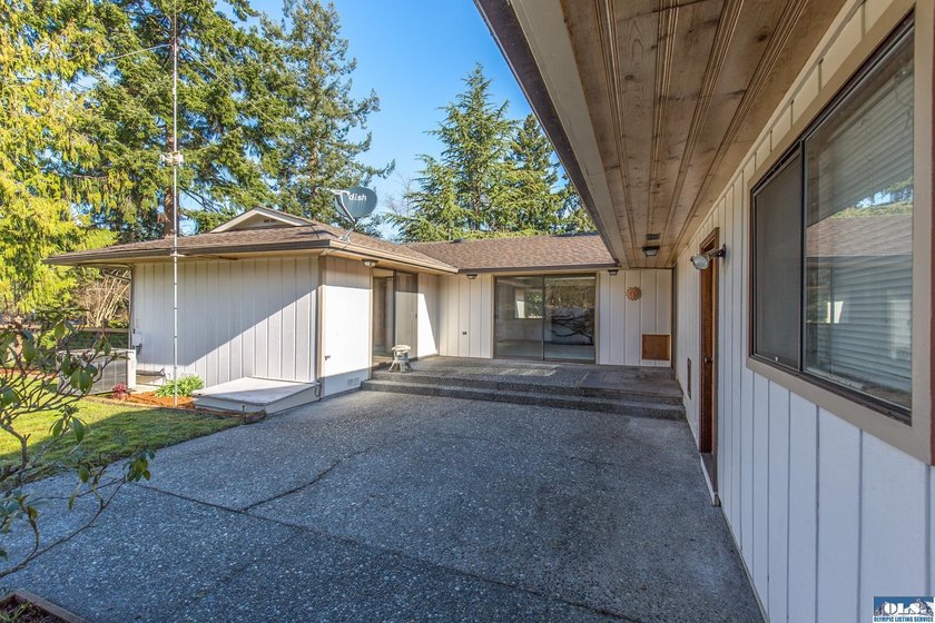 Set on 1.3 acres with beautiful mountain views, this property - photo 11
