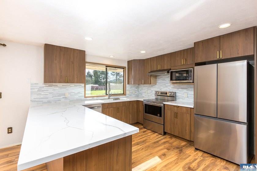 Set on 1.3 acres with beautiful mountain views, this property - photo 24