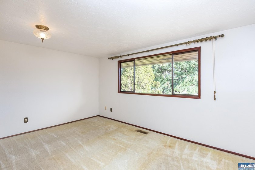 Set on 1.3 acres with beautiful mountain views, this property - photo 29