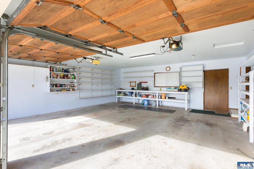Set on 1.3 acres with beautiful mountain views, this property - photo 37