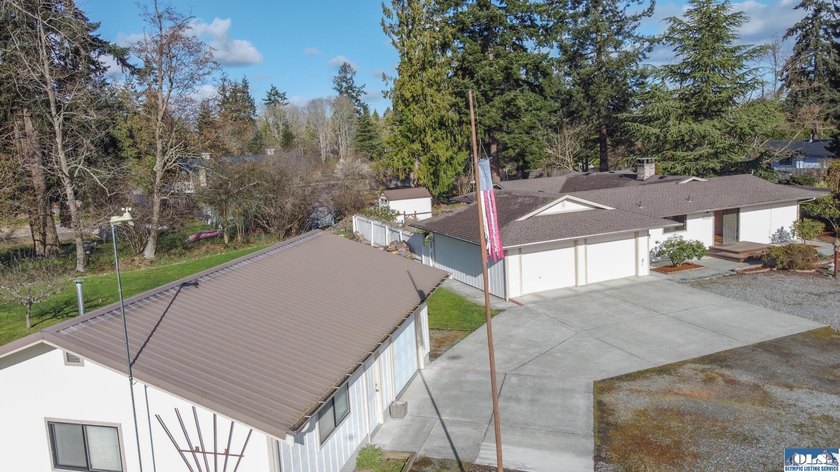 Set on 1.3 acres with beautiful mountain views, this property - photo 40