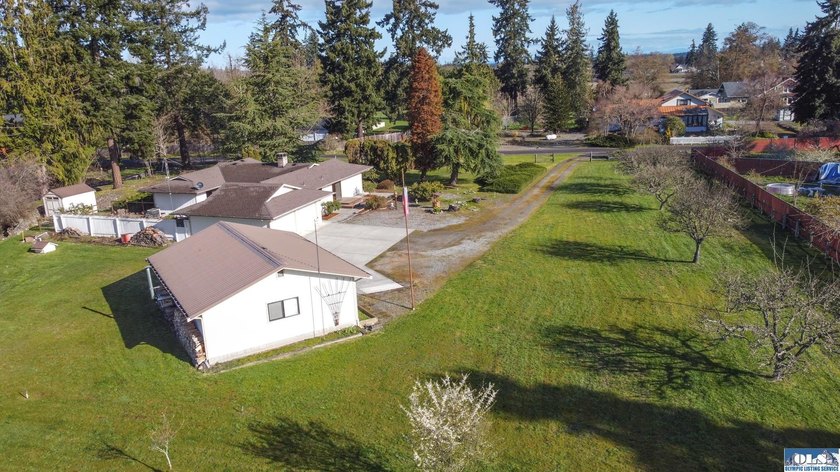 Set on 1.3 acres with beautiful mountain views, this property - photo 41
