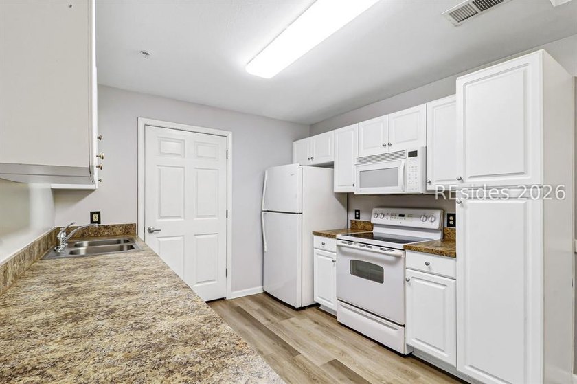 Price Improvement! Now Offered at $285,000! Just updated with - photo 4