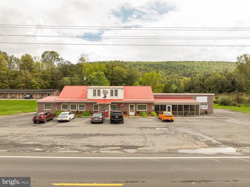 We are excited to present the Lost River Grill and Motel and - photo 4