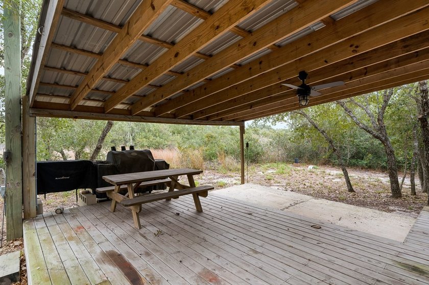 Nestled on wooded land along a quiet road, this newer - photo 22