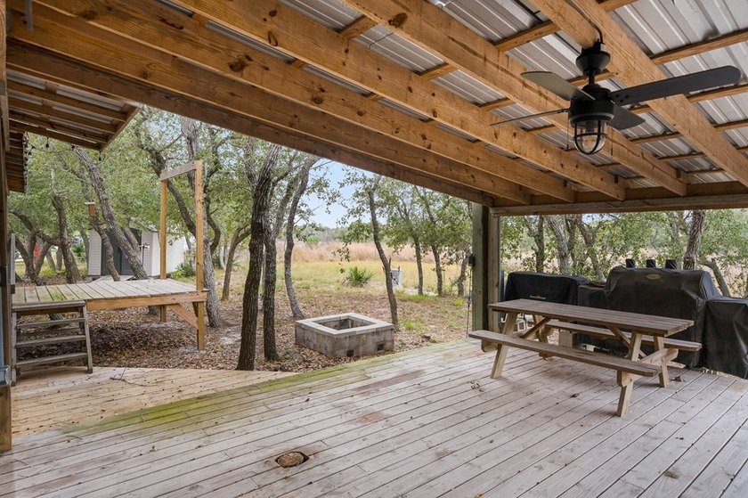 Nestled on wooded land along a quiet road, this newer - photo 24