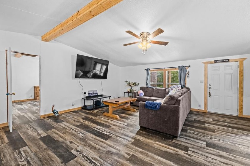Tucked away among nearly 39 acres of towering timber, this East - photo 5