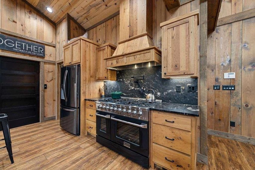 Set on 8.5 pristine acres, this extraordinary custom-built cabin - photo 31