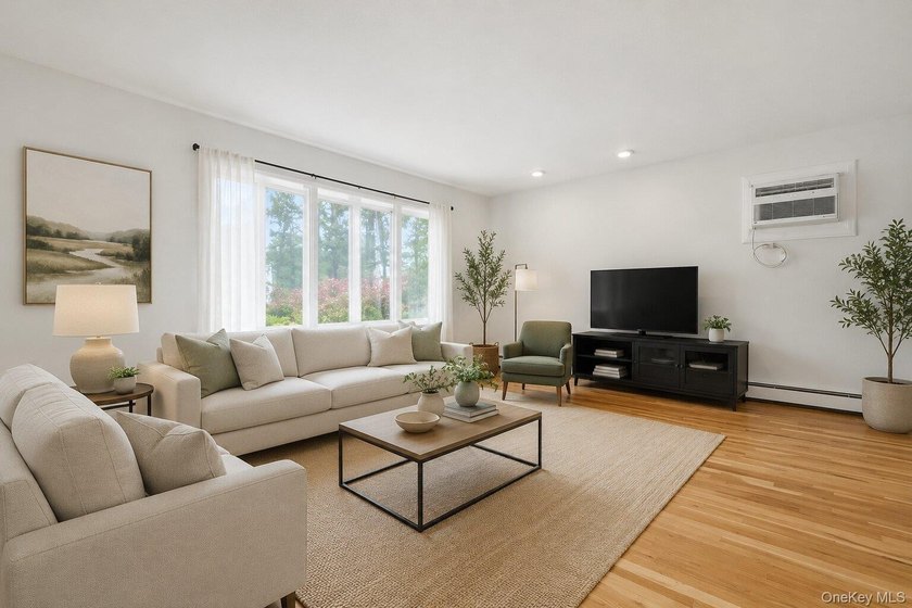 Beautifully maintained high-ranch home featuring 4 bedrooms and - photo 3
