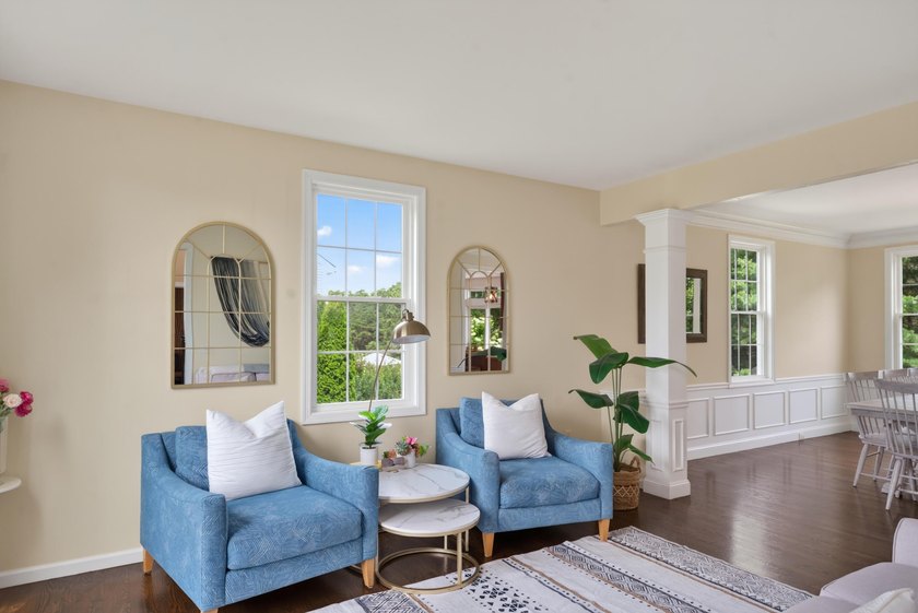 Nestled in the sought-after Pine Hollow neighborhood in the - photo 4