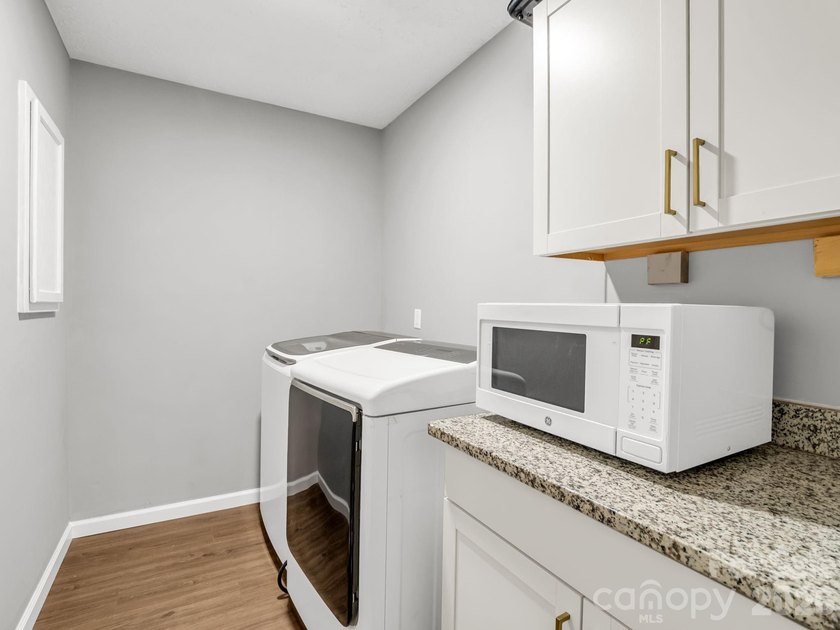 This newly renovated brick ranch home is hidden and secluded - photo 31