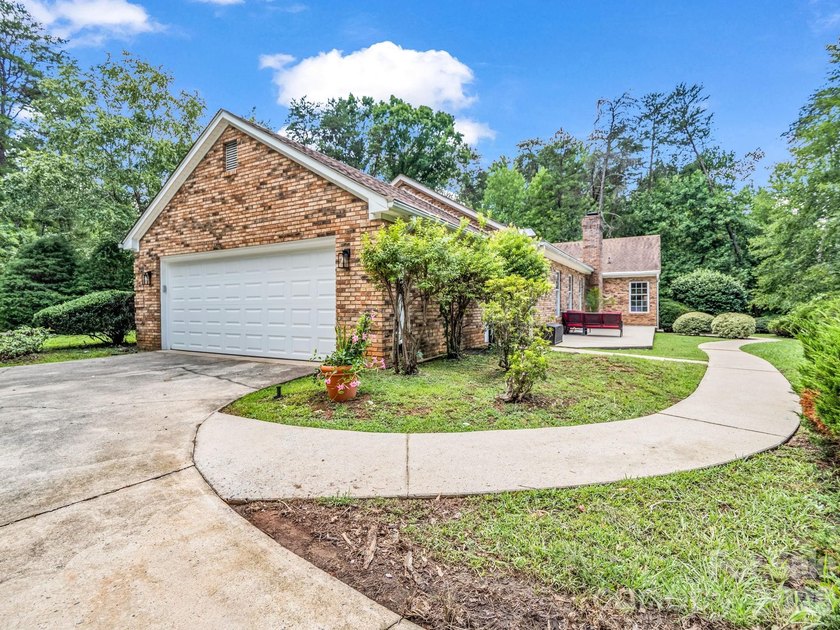 This newly renovated brick ranch home is hidden and secluded - photo 33