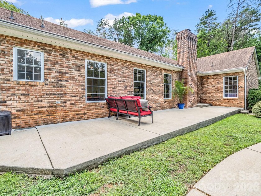This newly renovated brick ranch home is hidden and secluded - photo 35