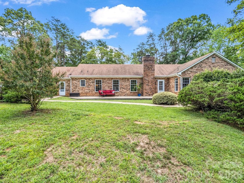 This newly renovated brick ranch home is hidden and secluded - photo 37