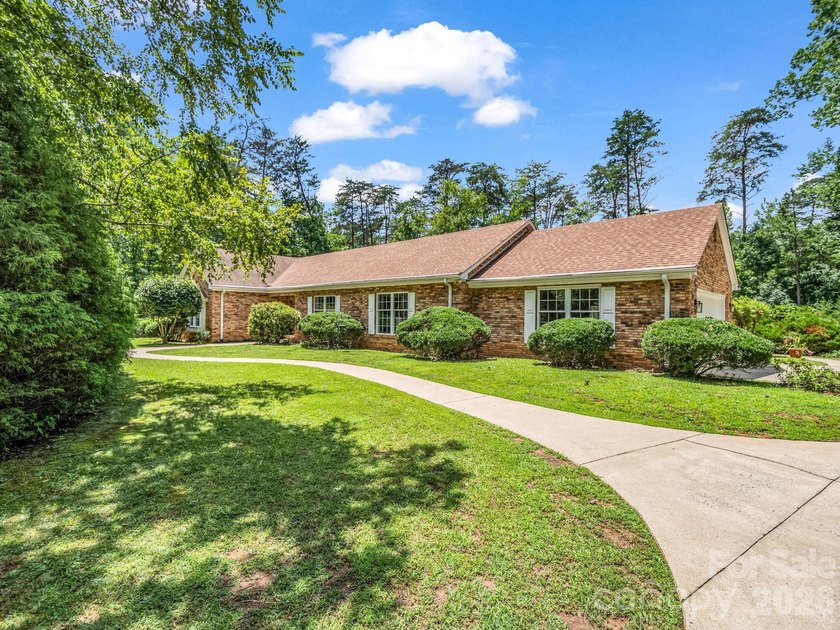 This newly renovated brick ranch home is hidden and secluded - photo 38