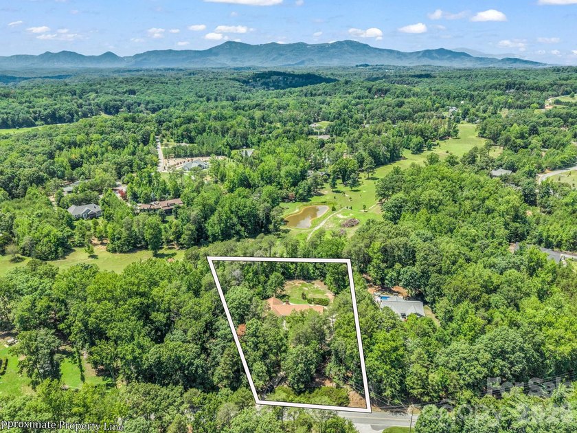 This newly renovated brick ranch home is hidden and secluded - photo 40