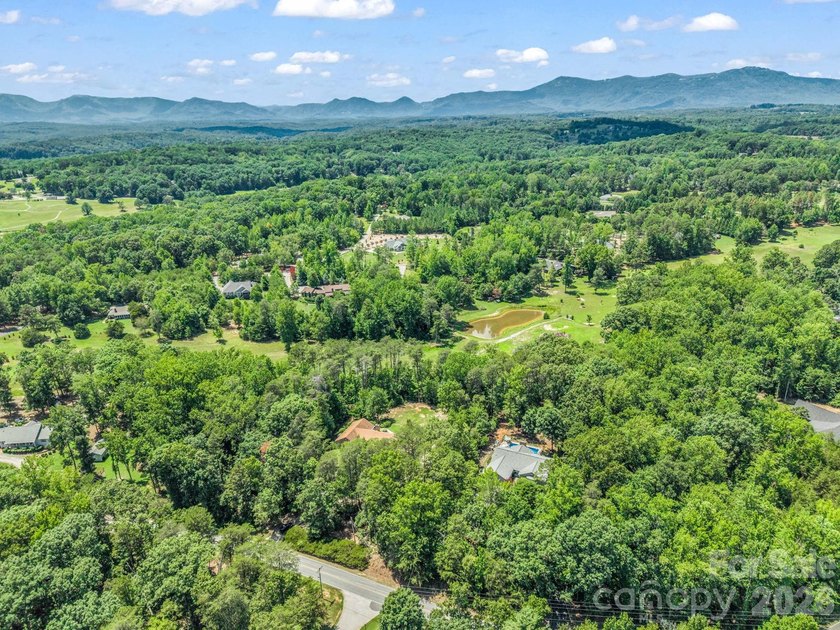 This newly renovated brick ranch home is hidden and secluded - photo 41