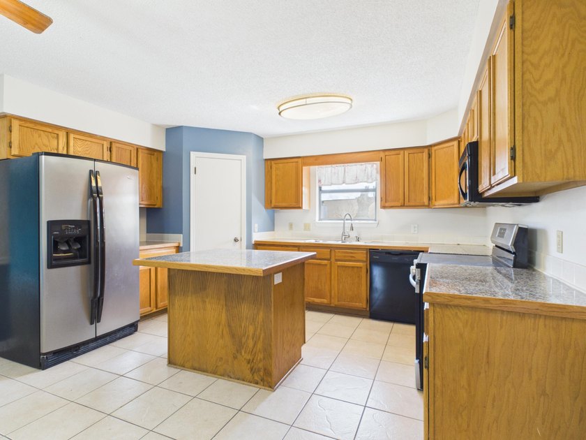 Welcome to 6073 Strickland Place, tucked away on a quiet - photo 8