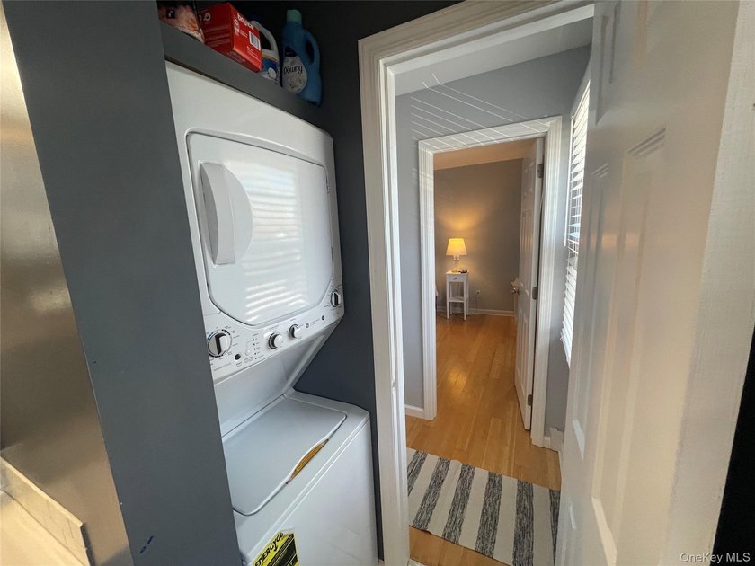 This inviting second-floor condo in Westhampton offers a - photo 11