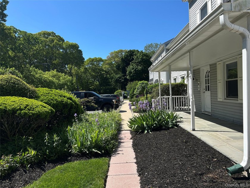 This inviting second-floor condo in Westhampton offers a - photo 13