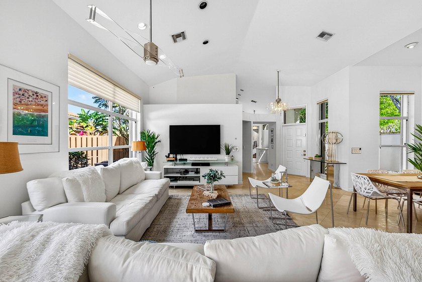 Updated 3 BD 3 BA home with bright, inviting living spaces and - photo 4