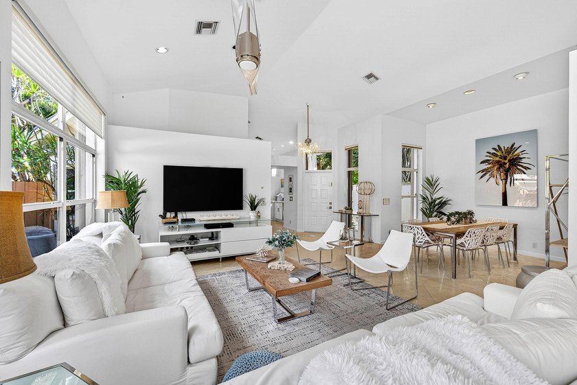 Updated 3 BD 3 BA home with bright, inviting living spaces and - photo 5