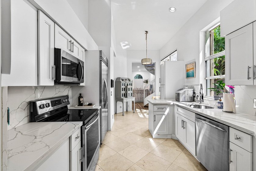 Updated 3 BD 3 BA home with bright, inviting living spaces and - photo 8