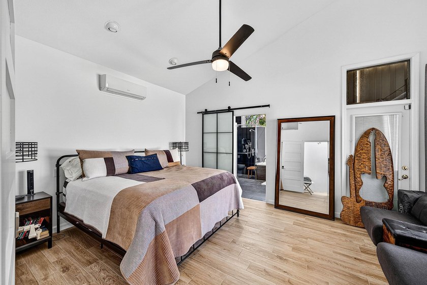 Updated 3 BD 3 BA home with bright, inviting living spaces and - photo 10