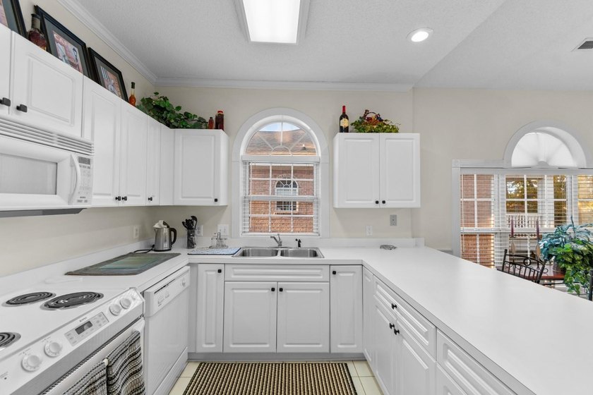 Discover the perfect blend of comfort and coastal living in this - photo 9
