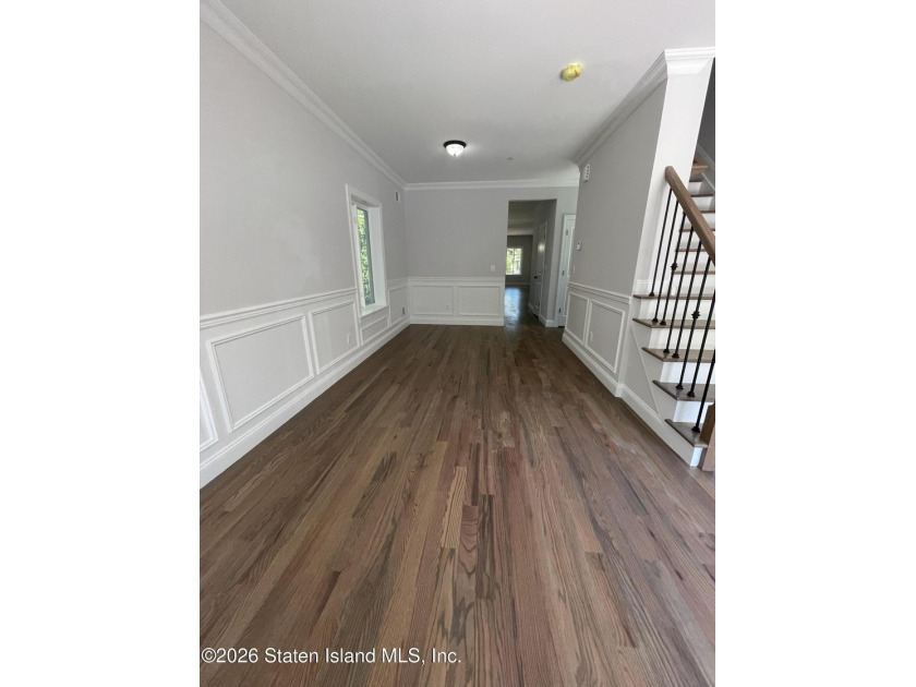 A unique gem! Gorgeous 2 family new construction. This - photo 4