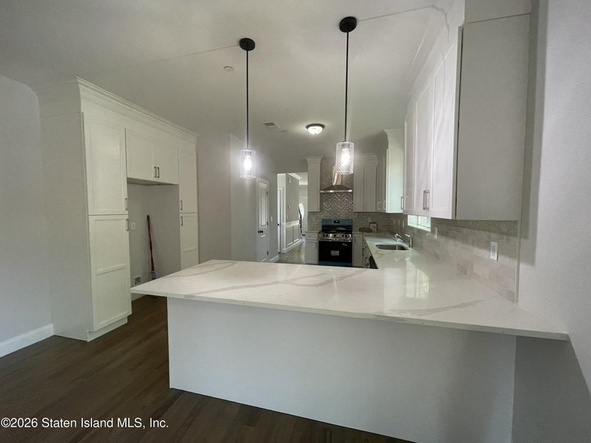 A unique gem! Gorgeous 2 family new construction. This - photo 10