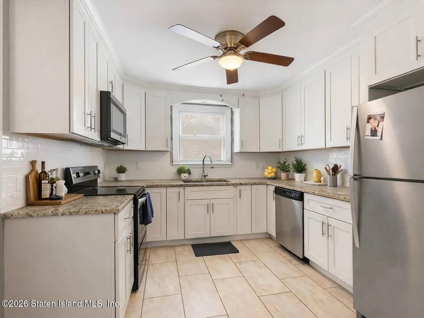 Welcome to 4 Cottage Avenue, a fully detached two-family home - photo 8