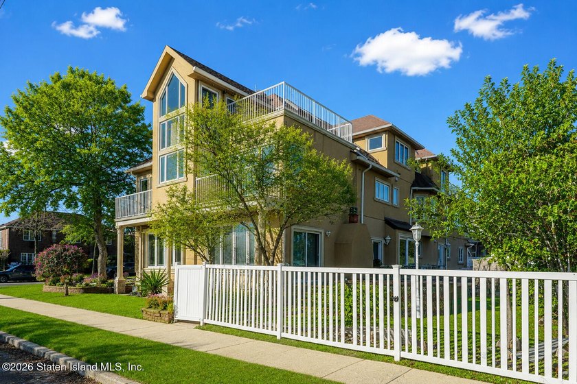 Perched above the water in S.E. Annadale, 133 Ryan Place doesn't - photo 2