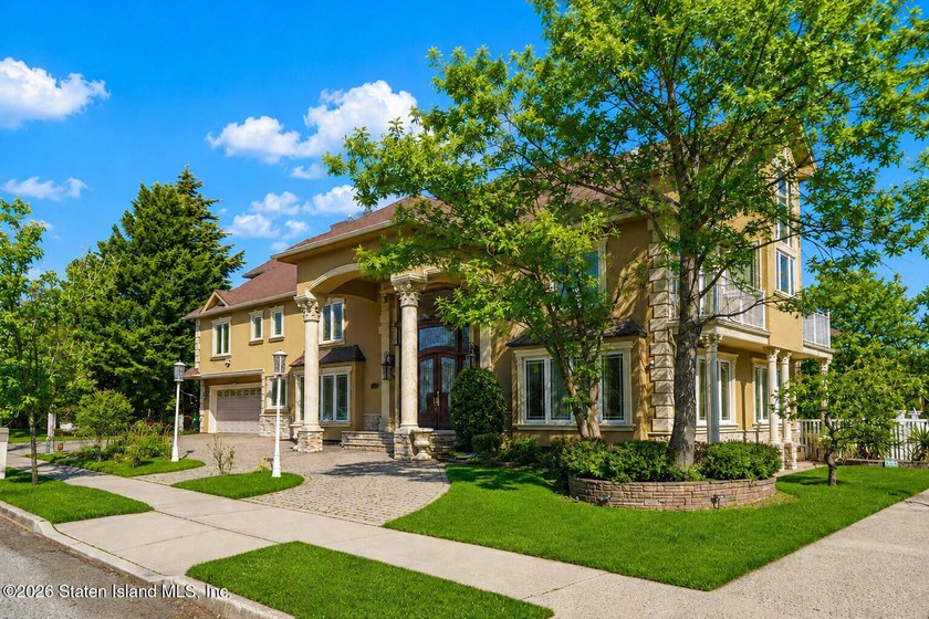 Perched above the water in S.E. Annadale, 133 Ryan Place doesn't - photo 3
