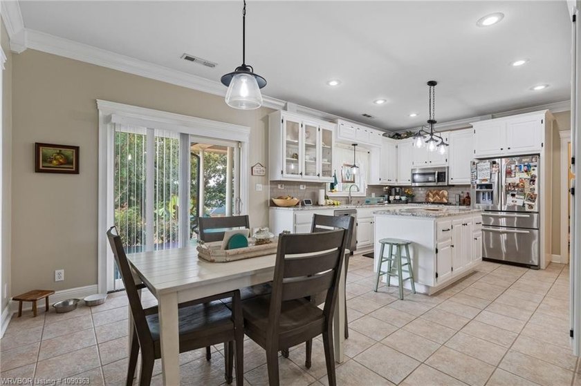 Timeless Southern elegance meets modern comfort in this - photo 11