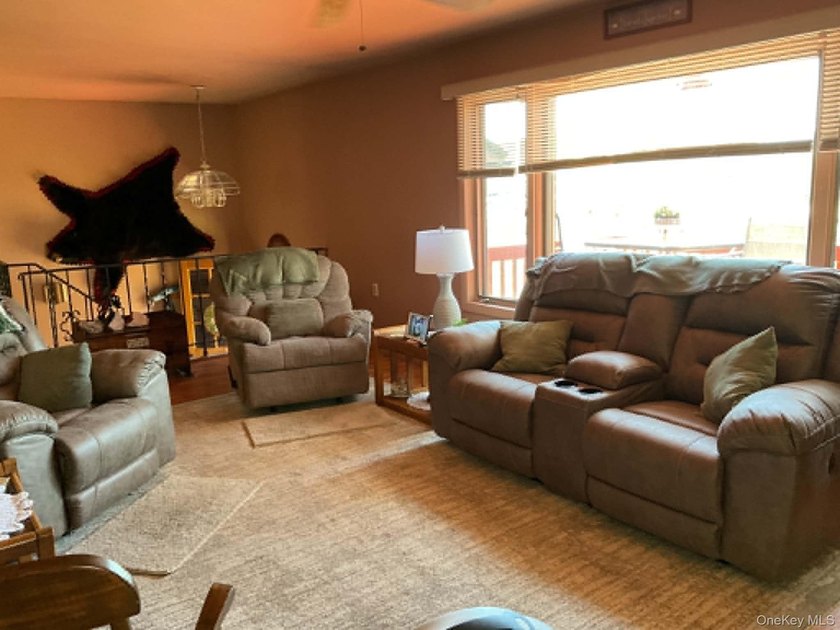 This well-maintained 3-bedroom, 1.5-bath split-level home offers - photo 44