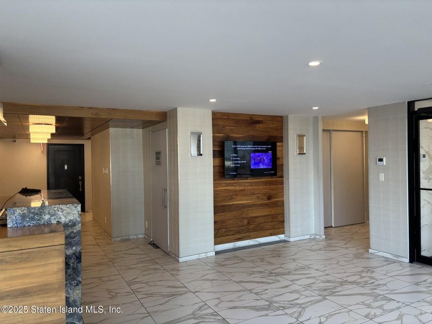 FABULOUS LUXURY LIVING, HI-RISE CONDO FEATURES- CERAMIC TILE - photo 2