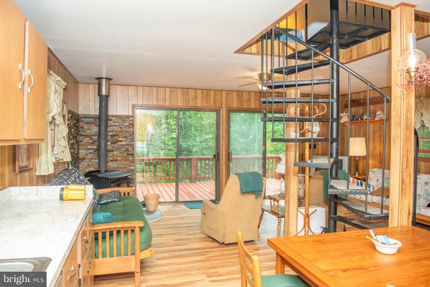 Bring your vision to this 1-bedroom, 1-bath chalet in the - photo 2