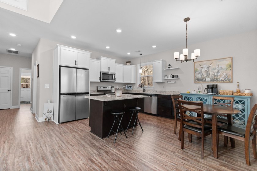 Experience the lowcountry lifestyle at 131 Rhodus Avenue, a - photo 8