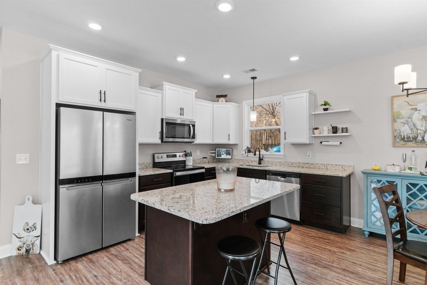 Experience the lowcountry lifestyle at 131 Rhodus Avenue, a - photo 9
