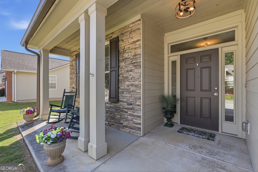 Welcome to this spacious 4 bedroom, 3 bath home in the highly - photo 2