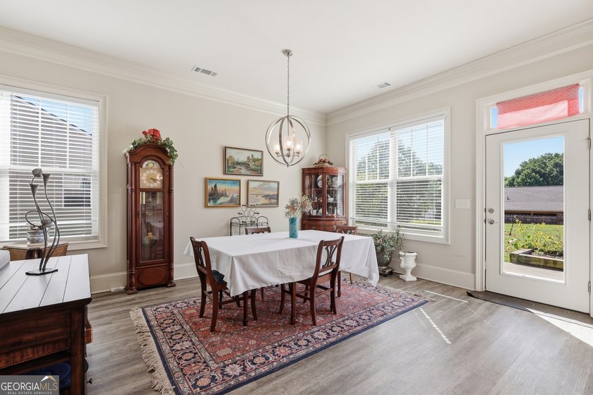 Welcome to this spacious 4 bedroom, 3 bath home in the highly - photo 6