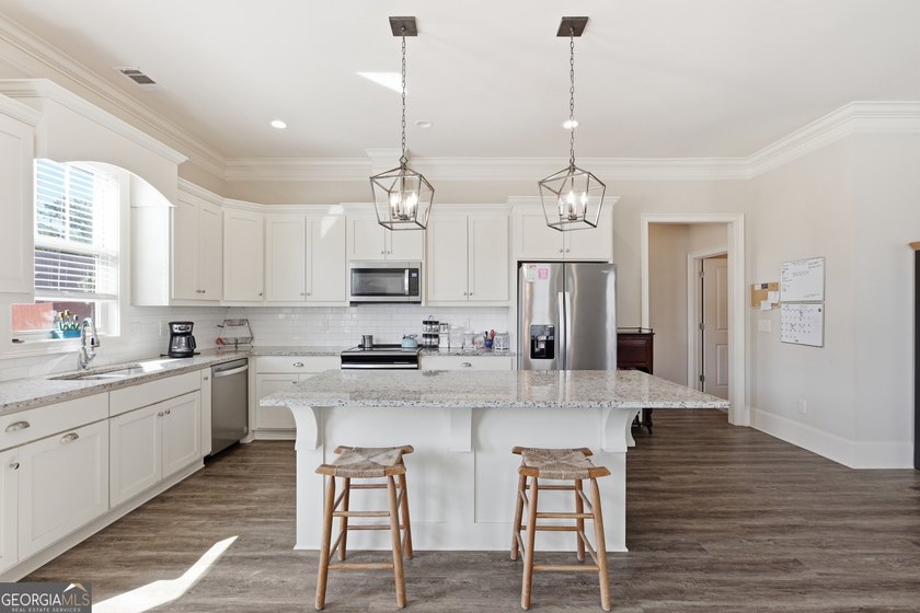 Welcome to this spacious 4 bedroom, 3 bath home in the highly - photo 10